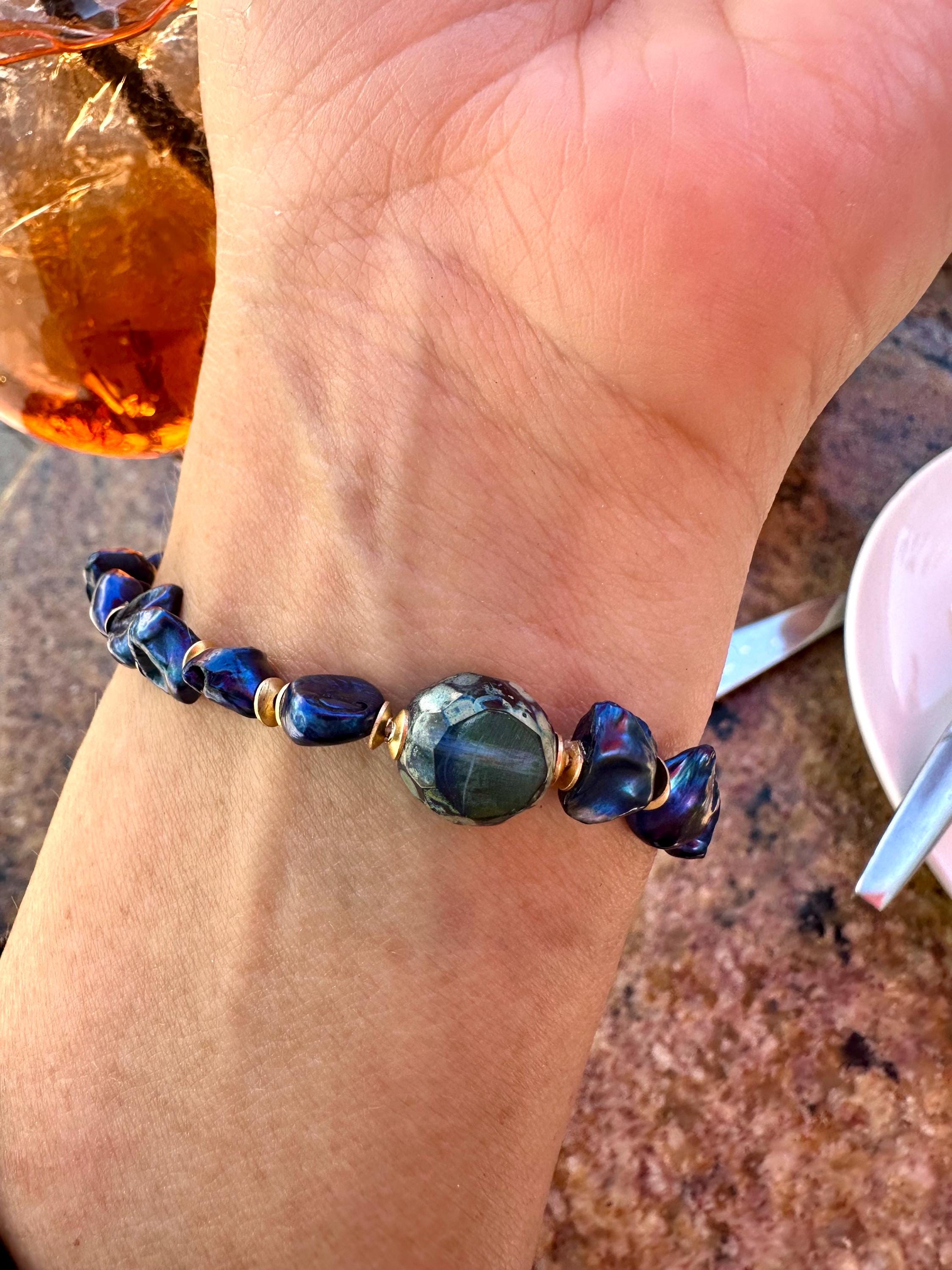 Freshwater Blue Pearl Bracelet With A Gold Songbird Charm