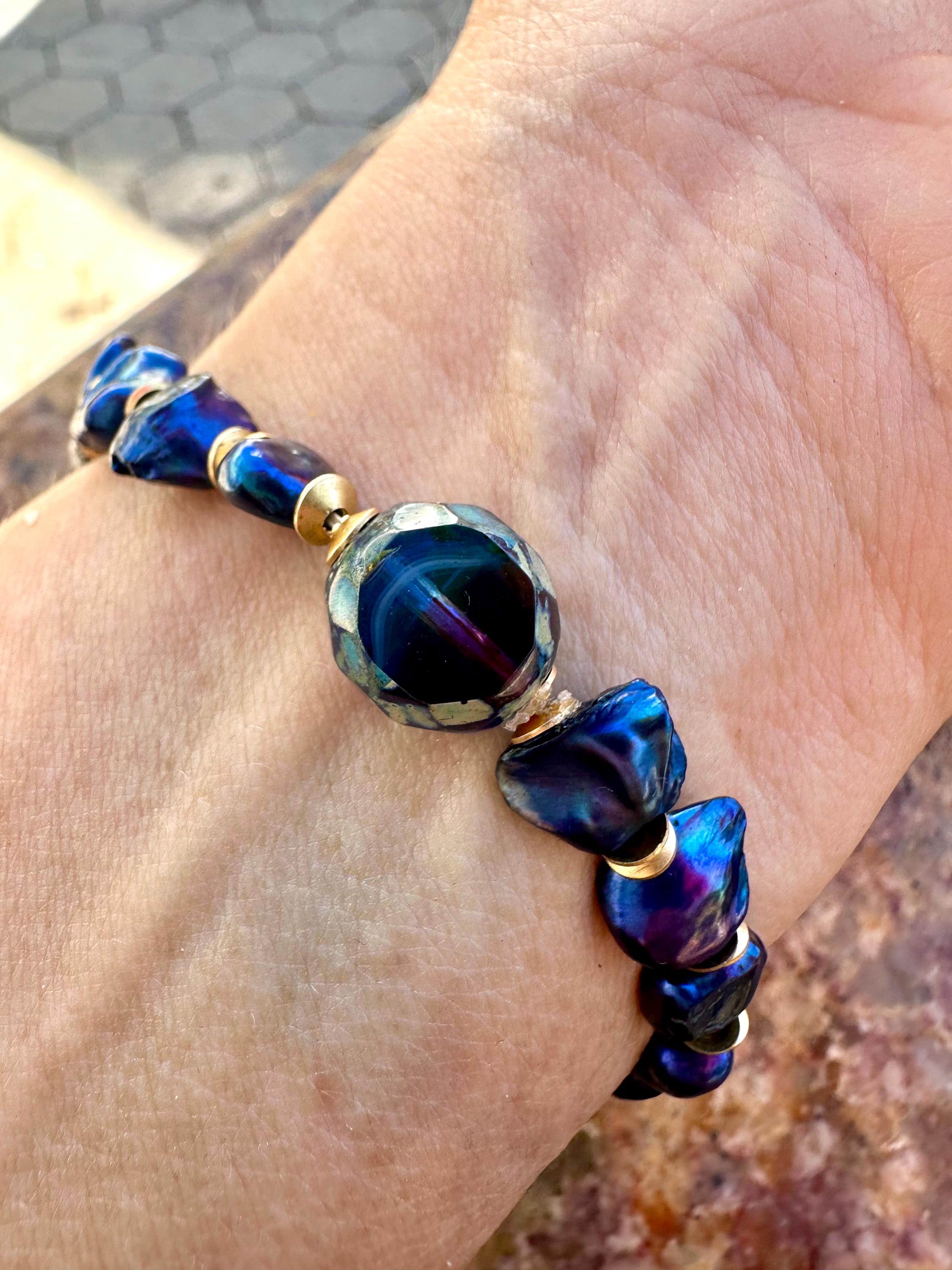 Freshwater Blue Pearl Bracelet With A Gold Songbird Charm