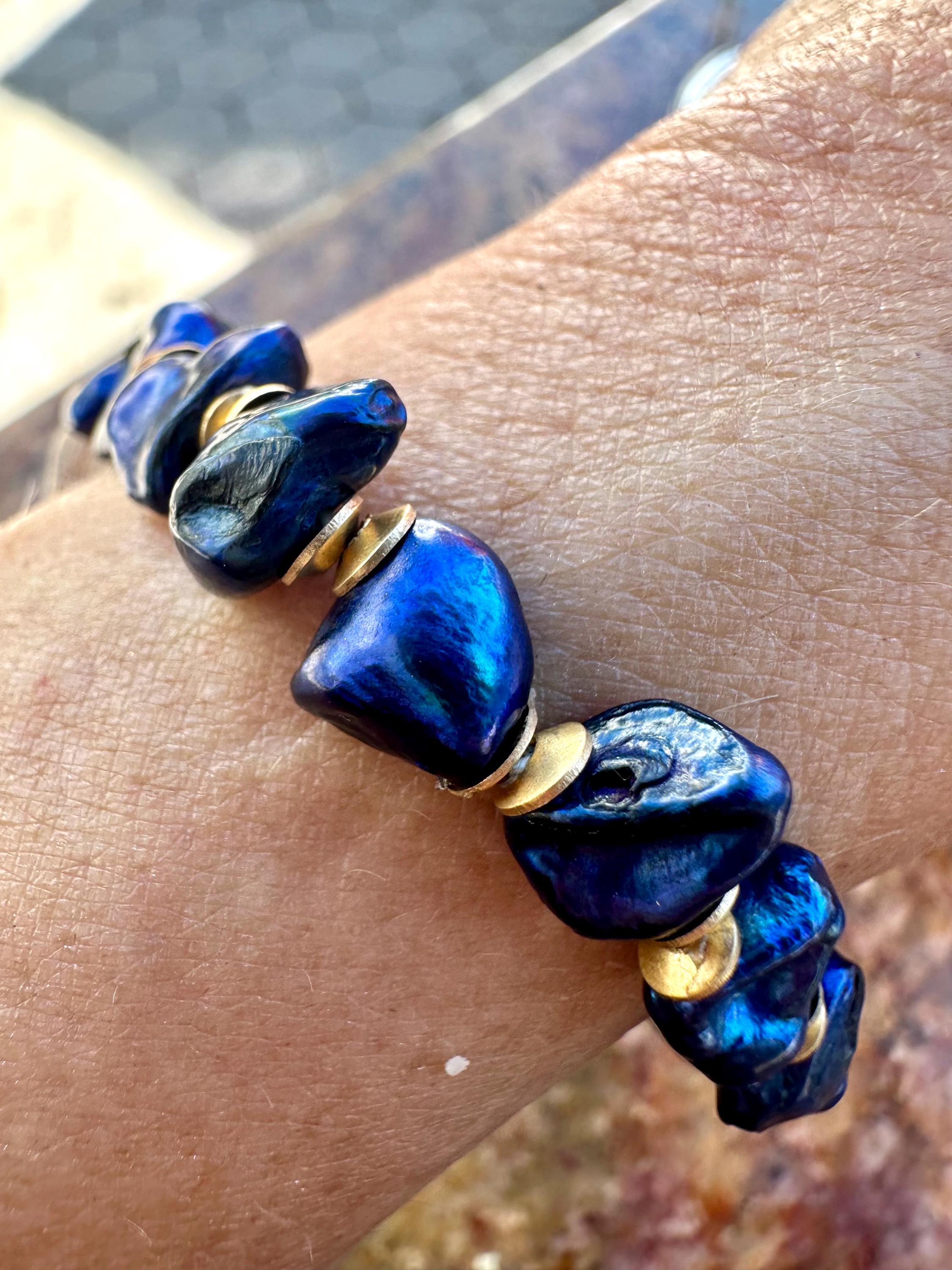 Freshwater Blue Pearl Bracelet With A Gold Songbird Charm